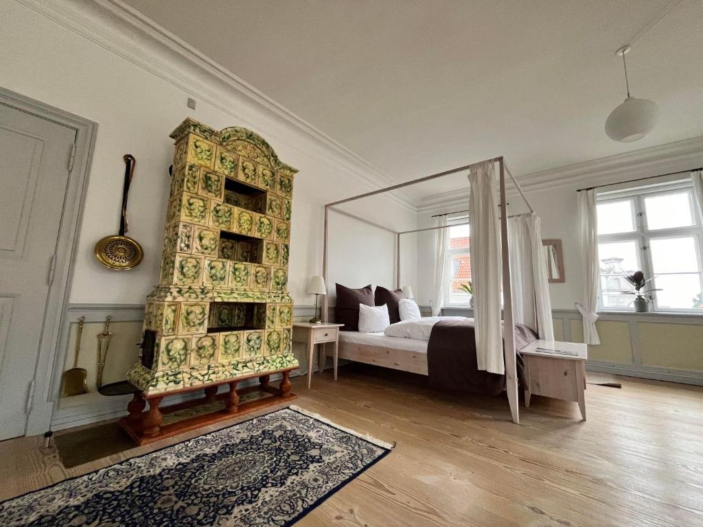 Postel nebo postele na pokoji v ubytování Brødremenighedens Hotel