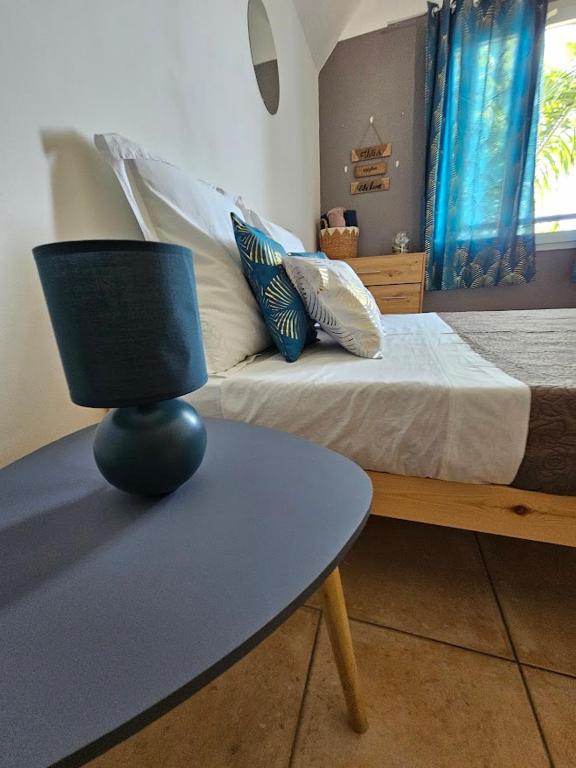 Postel nebo postele na pokoji v ubytování secret de l'île