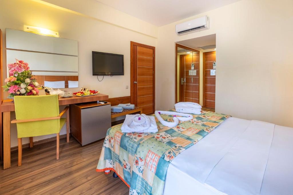 Postel nebo postele na pokoji v ubytování Viking Park Hotel