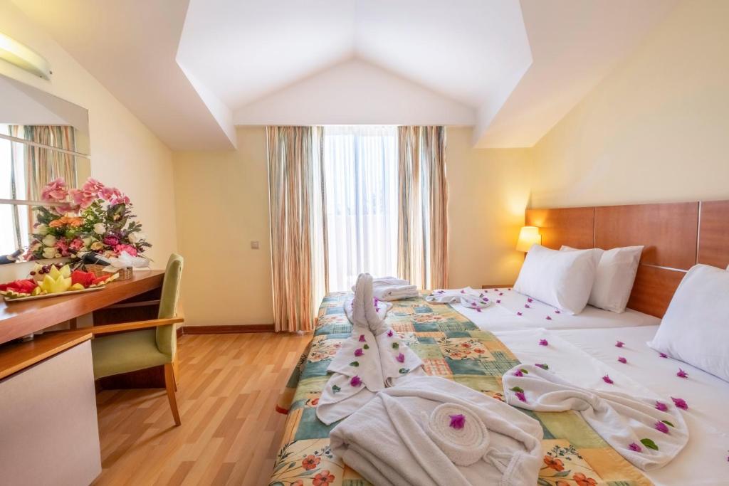 Postel nebo postele na pokoji v ubytování Viking Park Hotel