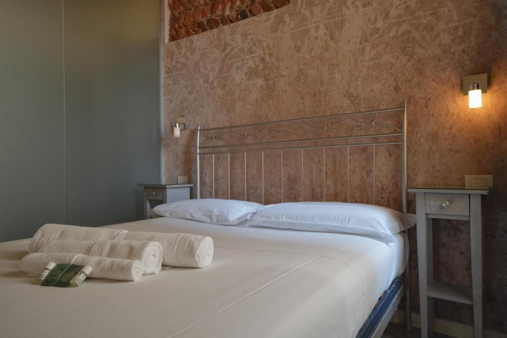 Postel nebo postele na pokoji v ubytování Palazzo di Giulietta - Juliet's Palace Verona