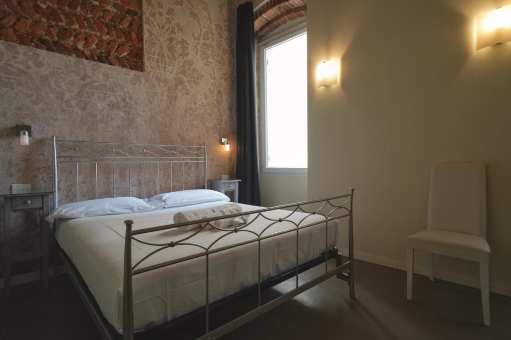 Postel nebo postele na pokoji v ubytování Palazzo di Giulietta - Juliet's Palace Verona
