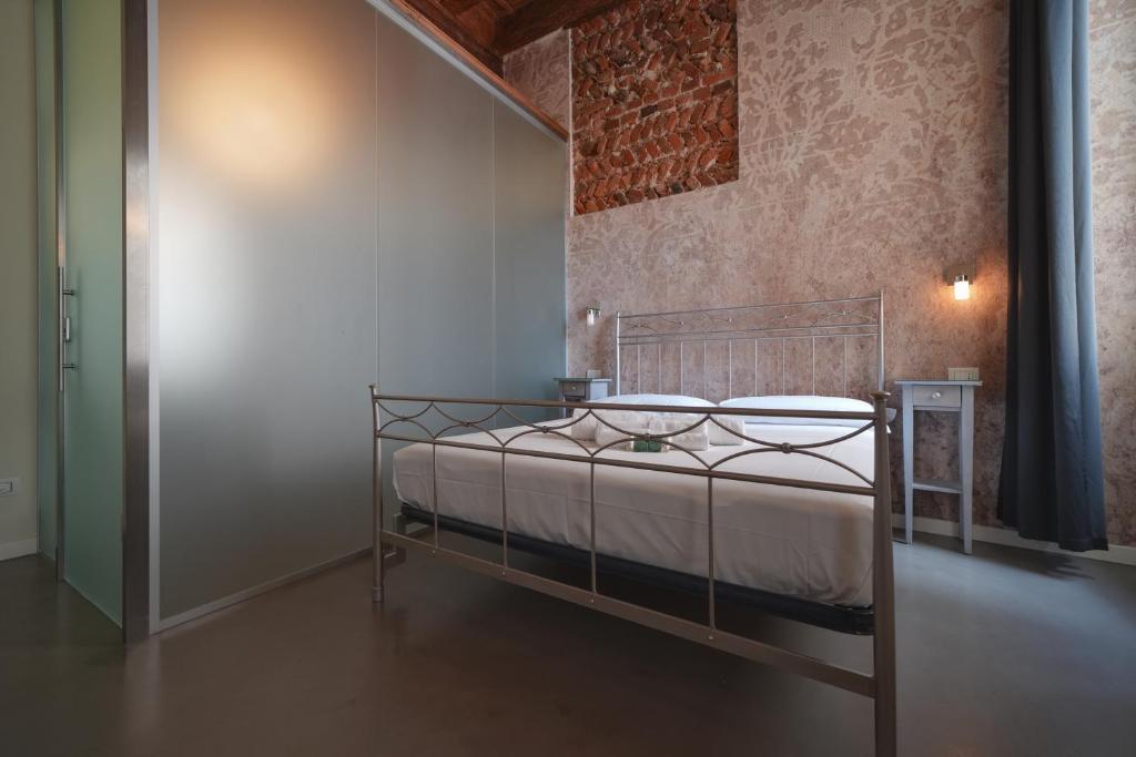Postel nebo postele na pokoji v ubytování Palazzo di Giulietta - Juliet's Palace Verona