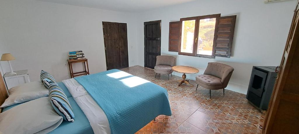 Postel nebo postele na pokoji v ubytování Casa el Chorro