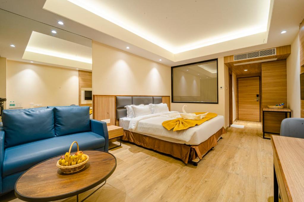 Postel nebo postele na pokoji v ubytování Hotel Palacio Regency
