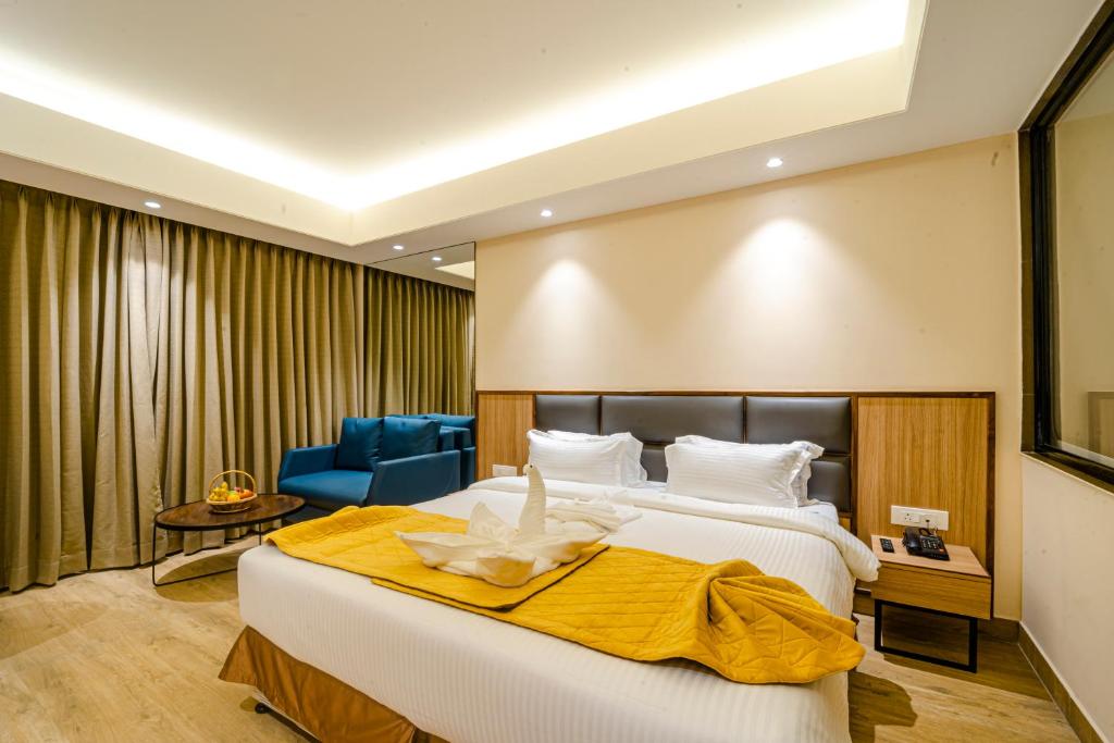 Postel nebo postele na pokoji v ubytování Hotel Palacio Regency