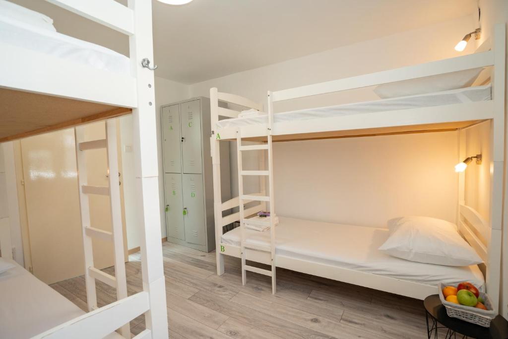 Postel nebo postele na pokoji v ubytování Hostel Novalis