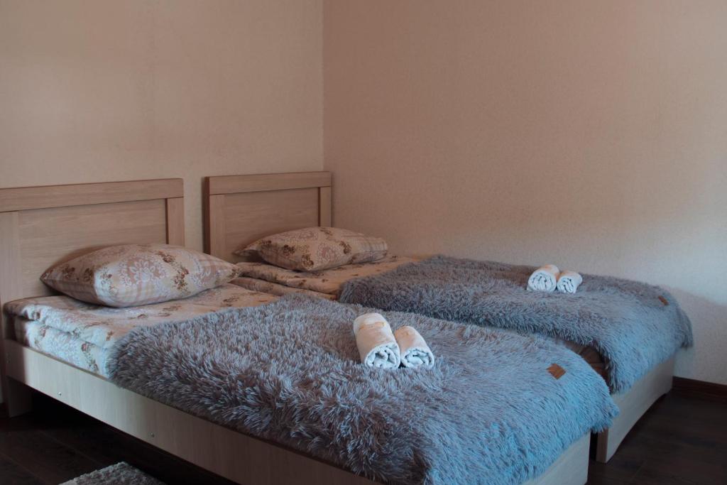 Postel nebo postele na pokoji v ubytování Guest House Melissa