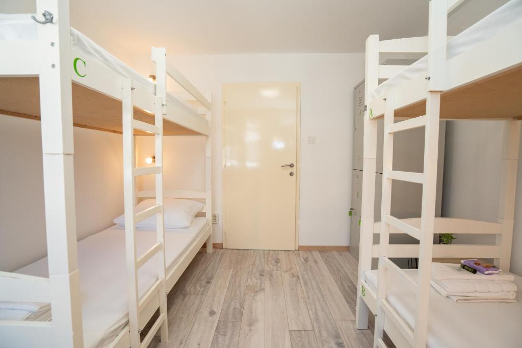 Postel nebo postele na pokoji v ubytování Hostel Novalis