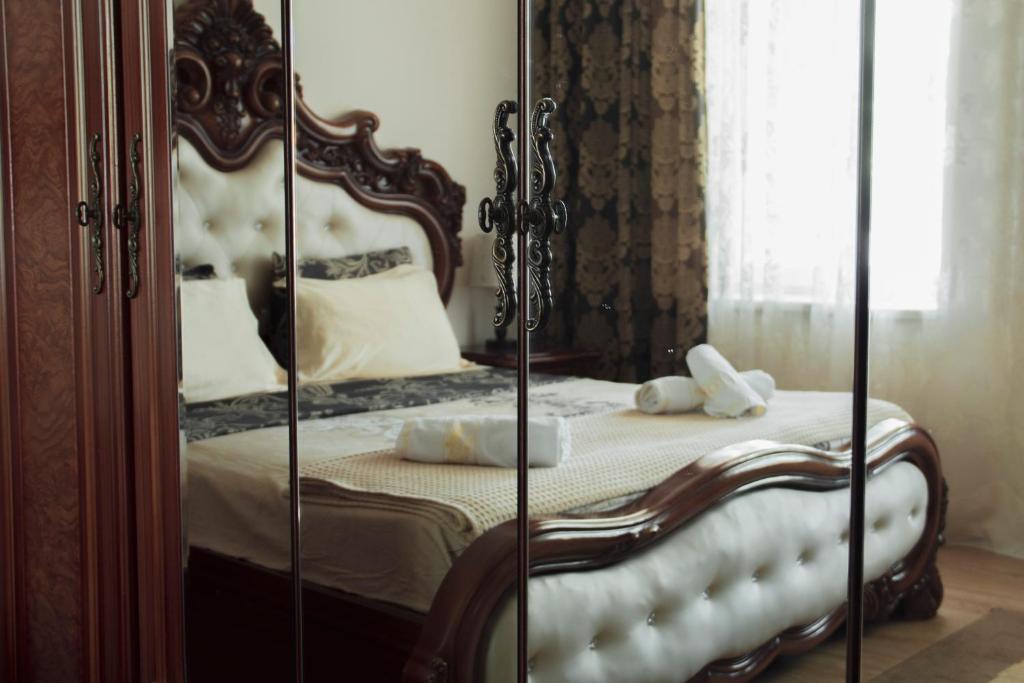 Postel nebo postele na pokoji v ubytování Guest House Melissa