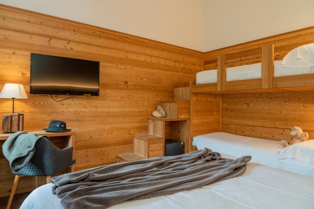 Łóżko lub łóżka w pokoju w obiekcie Hotel Nevada