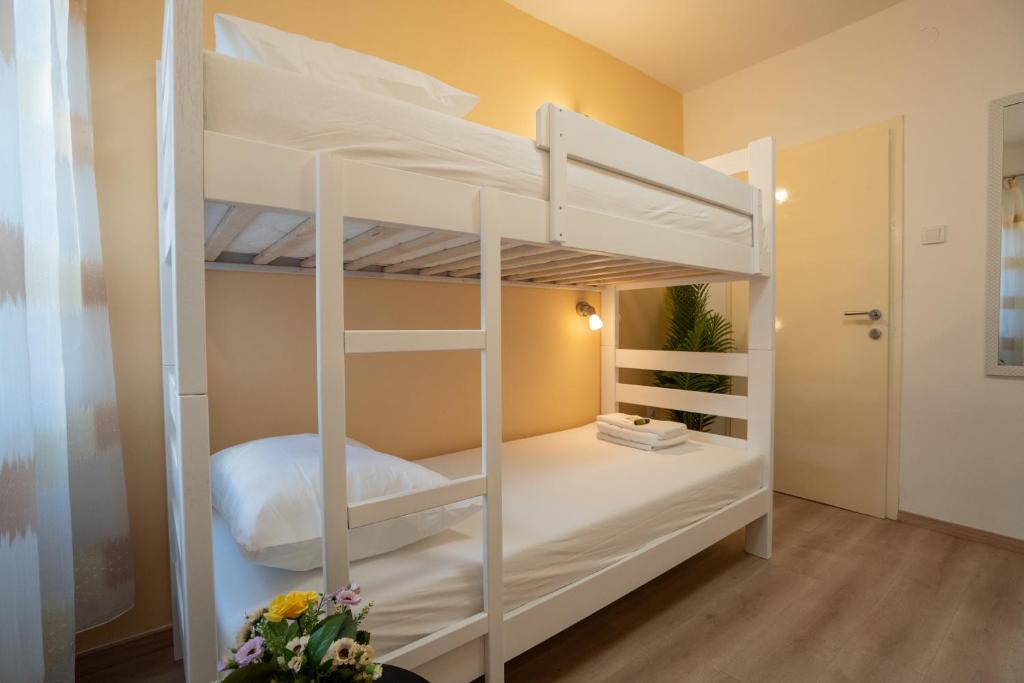 Postel nebo postele na pokoji v ubytování Hostel Novalis