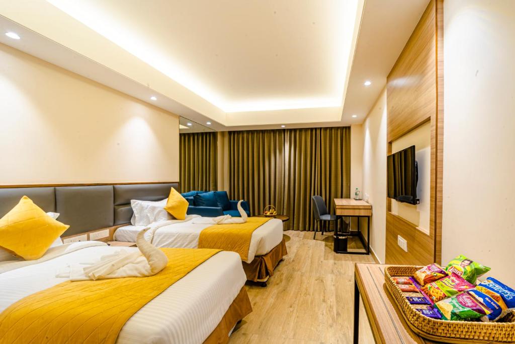 Postel nebo postele na pokoji v ubytování Hotel Palacio Regency