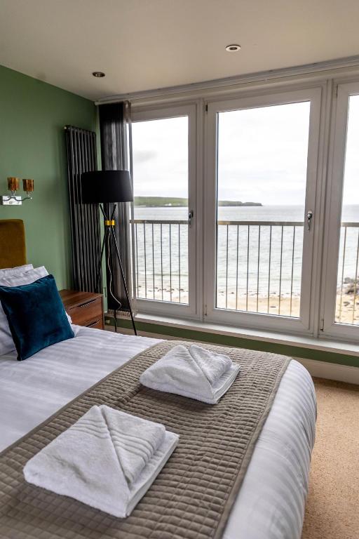 Postel nebo postele na pokoji v ubytování Marine Rooms