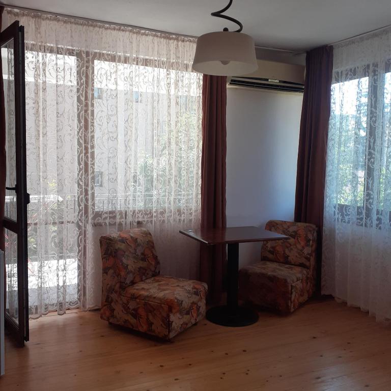 Posezení v ubytování Guest House Sun