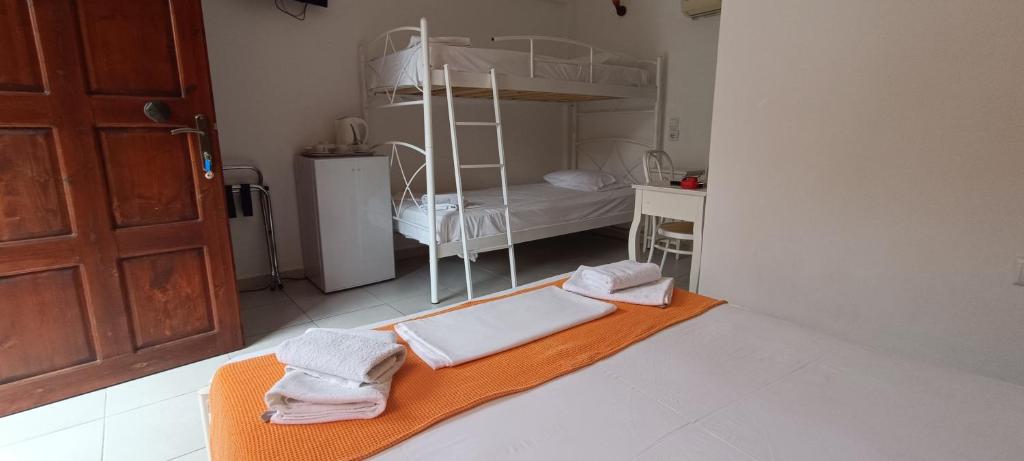 Postel nebo postele na pokoji v ubytování Villa Molos
