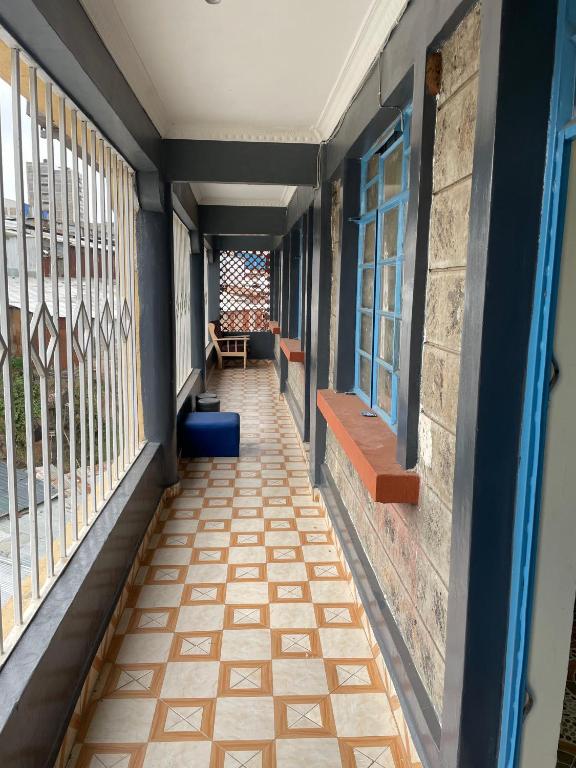 Postel nebo postele na pokoji v ubytování Future Stars Centre Kibera