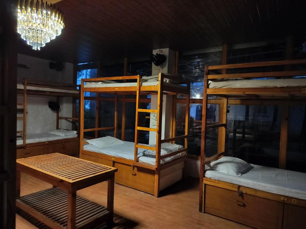 Postel nebo postele na pokoji v ubytování Jungle by sturmfrei Pushkar