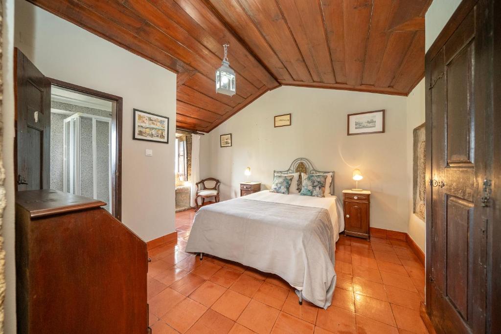 Postel nebo postele na pokoji v ubytování Quinta Da Aldeia