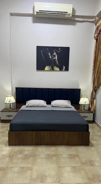 Postel nebo postele na pokoji v ubytování Karnak Flats