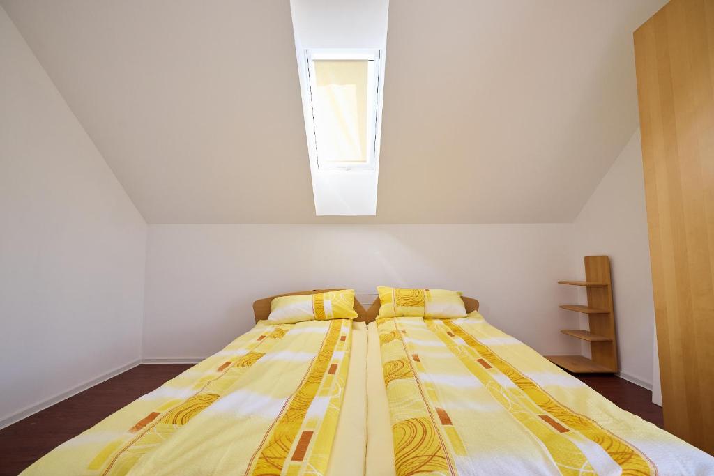 Postel nebo postele na pokoji v ubytování Ferienhaus SWD