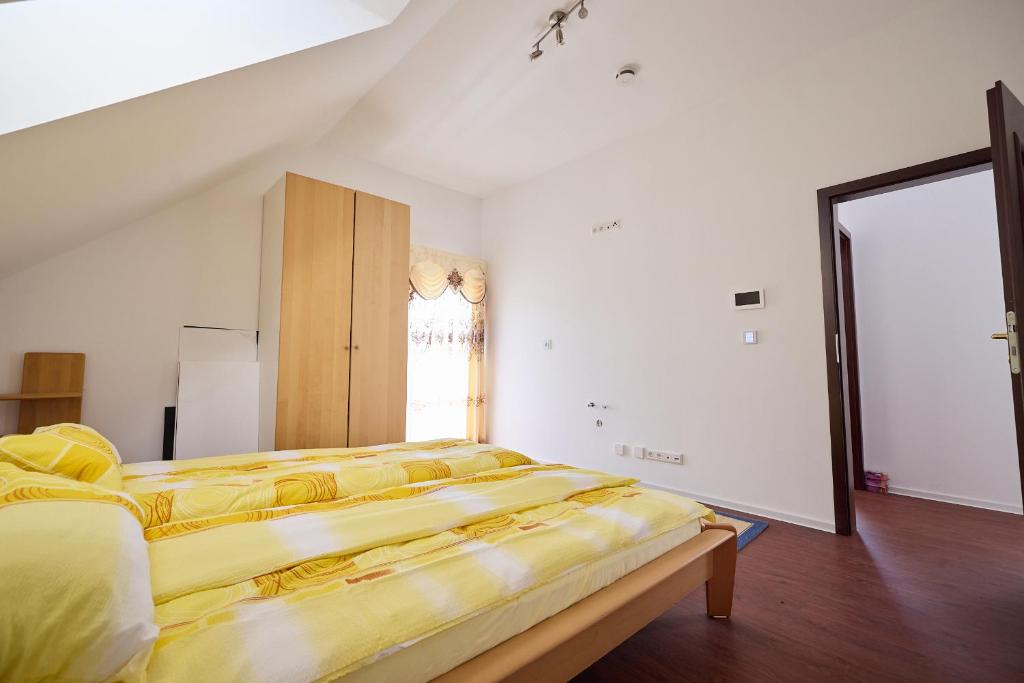 Postel nebo postele na pokoji v ubytování Ferienhaus SWD
