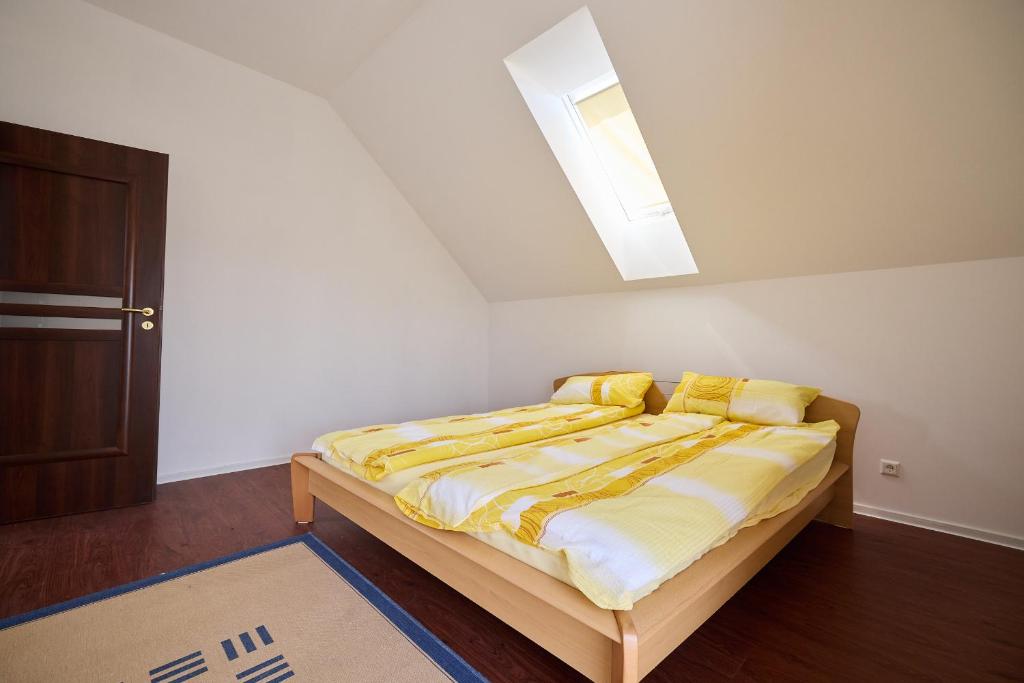 Postel nebo postele na pokoji v ubytování Ferienhaus SWD