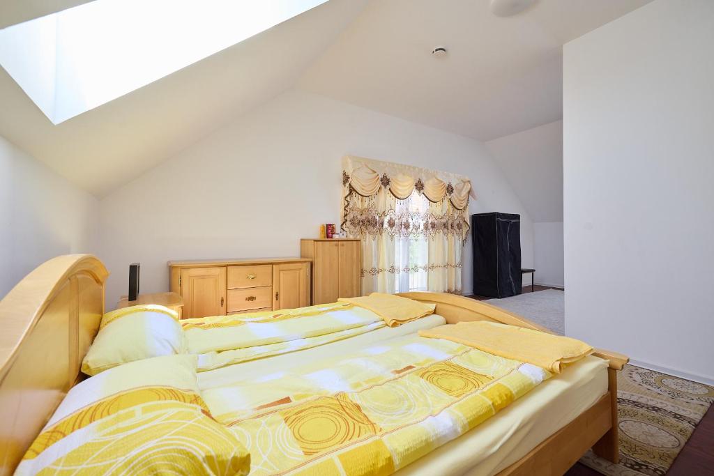 Postel nebo postele na pokoji v ubytování Ferienhaus SWD
