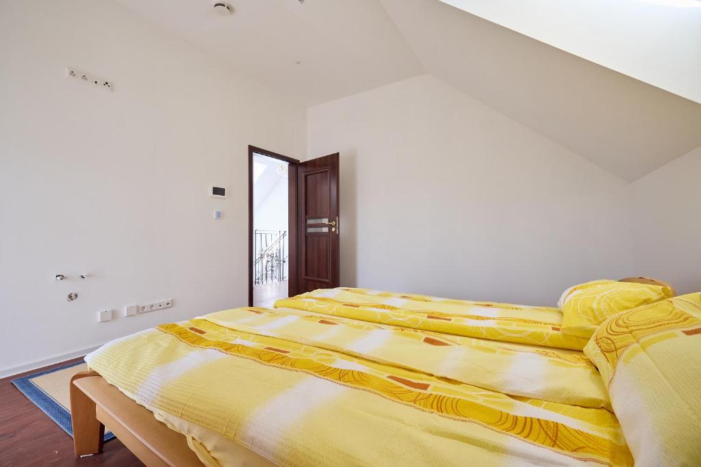 Postel nebo postele na pokoji v ubytování Ferienhaus SWD