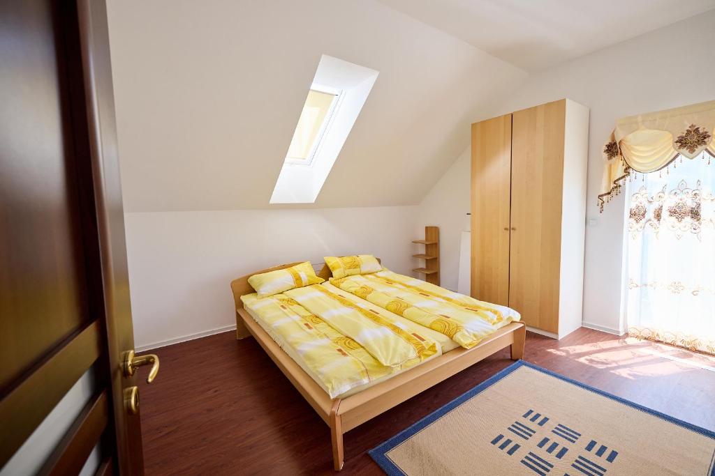 Postel nebo postele na pokoji v ubytování Ferienhaus SWD