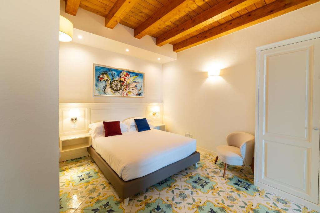 Postel nebo postele na pokoji v ubytování Fortaleza Charme House