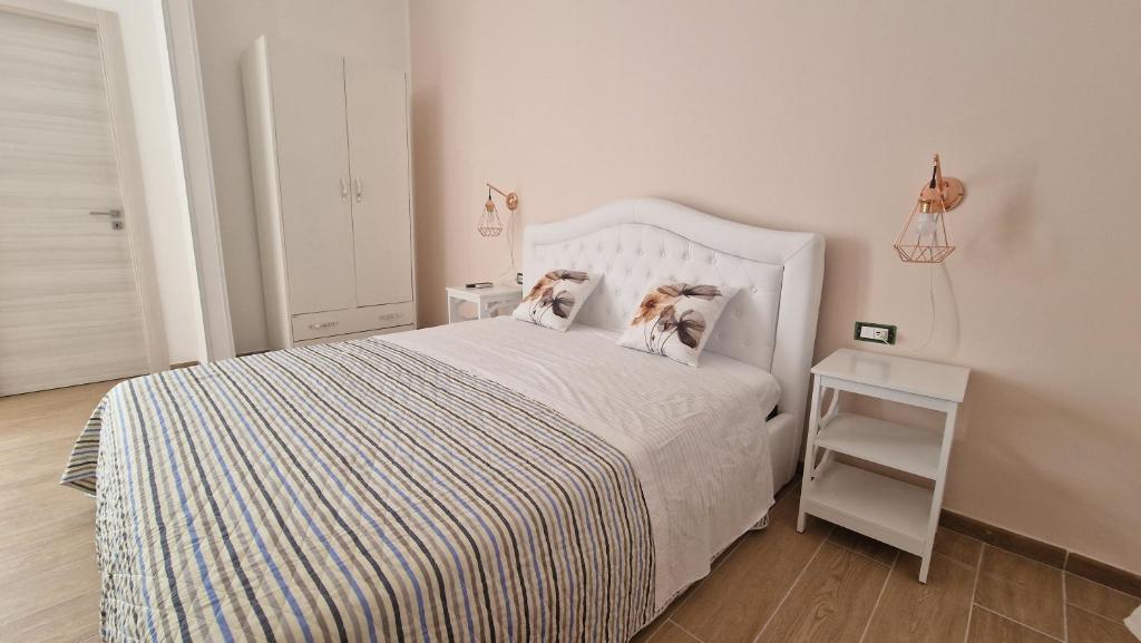 Postel nebo postele na pokoji v ubytování La Casa di Sayf