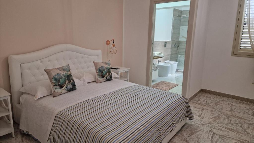Postel nebo postele na pokoji v ubytování La Casa di Sayf