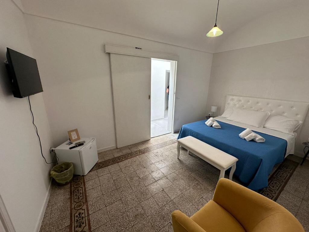 Postel nebo postele na pokoji v ubytování Immacolata Rooms