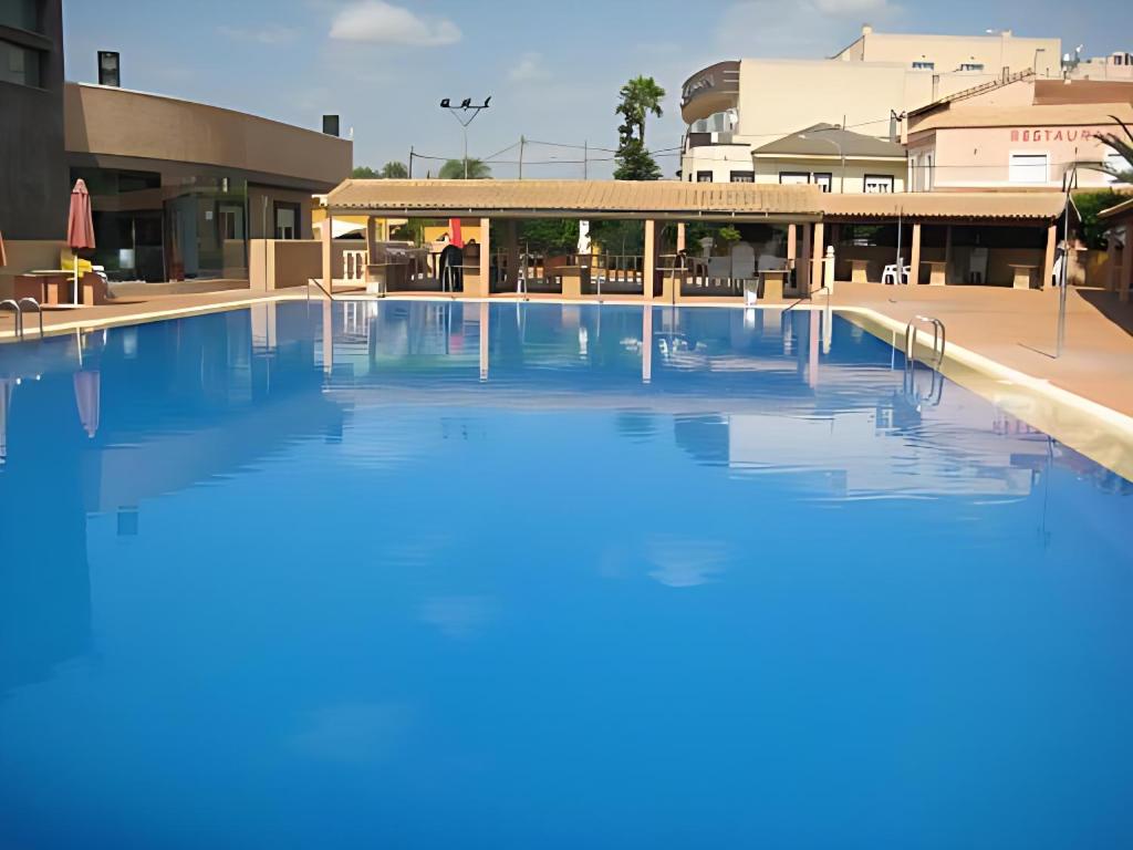 Piscina en o cerca de Hospedium Hotel Los Periquitos