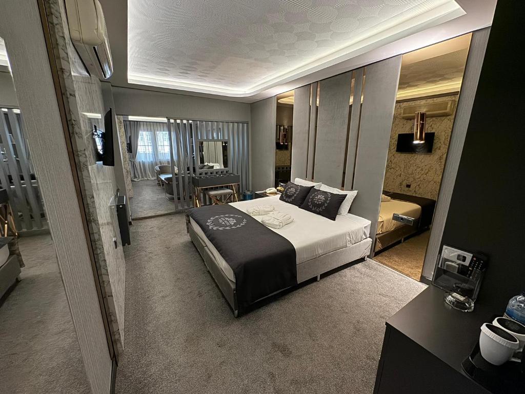 Postel nebo postele na pokoji v ubytování BÇ Ruby Hotel