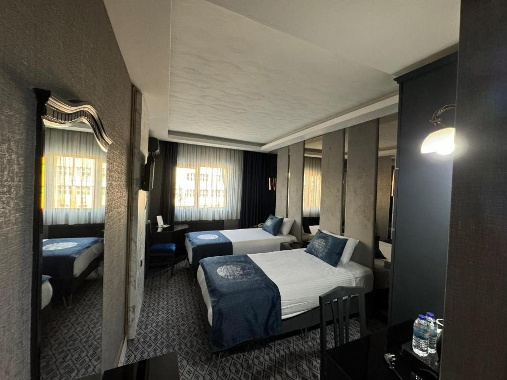 Postel nebo postele na pokoji v ubytování BÇ Ruby Hotel