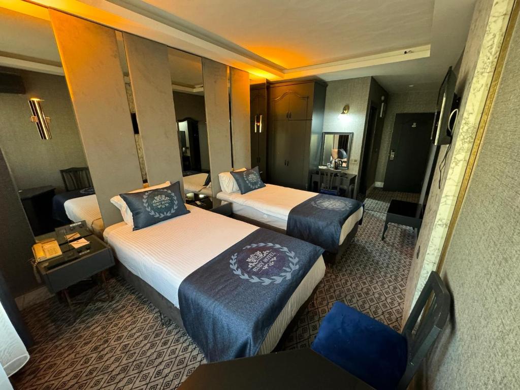 Postel nebo postele na pokoji v ubytování BÇ Ruby Hotel