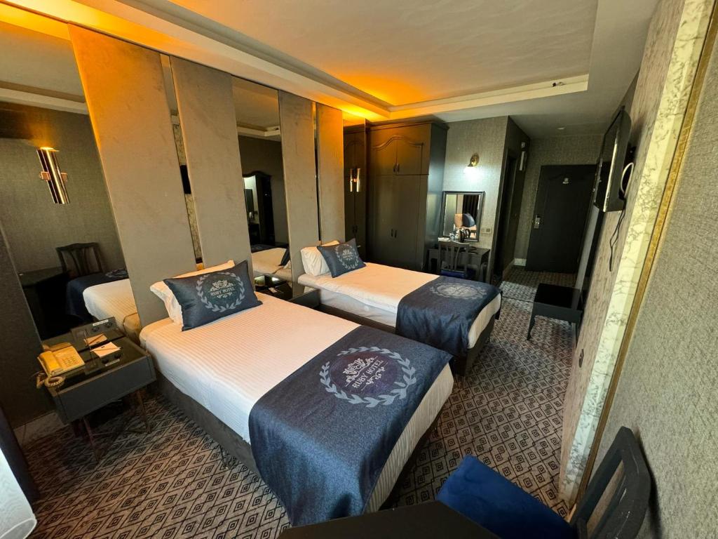 Postel nebo postele na pokoji v ubytování BÇ Ruby Hotel