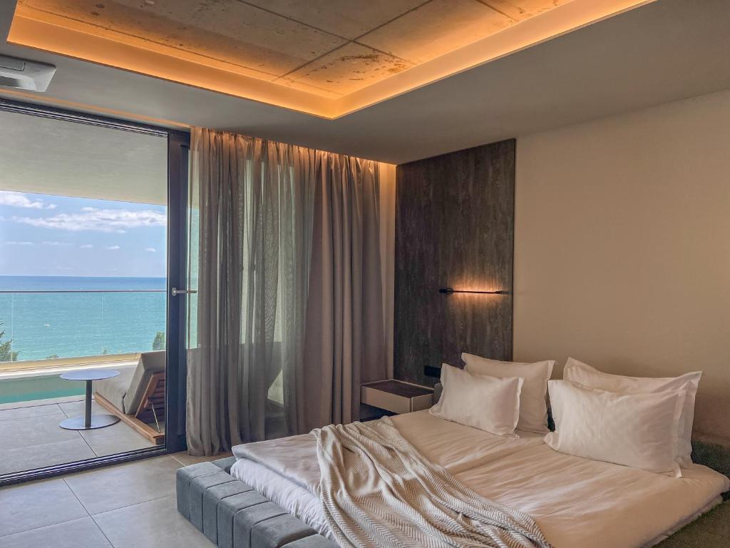 Postel nebo postele na pokoji v ubytování GRIFID Noa - Premium Ultra All Inclusive