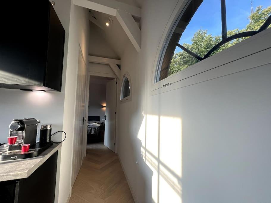 Kuchyň nebo kuchyňský kout v ubytování Beemster Uniek Tiny House