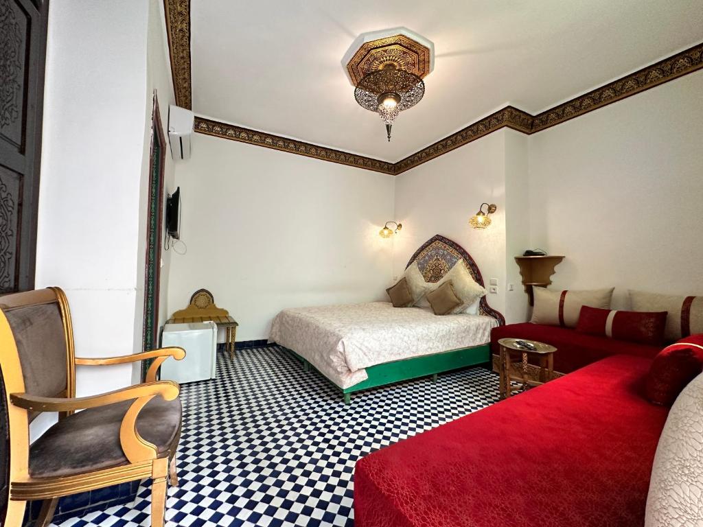 Postel nebo postele na pokoji v ubytování Riad Shama Fes