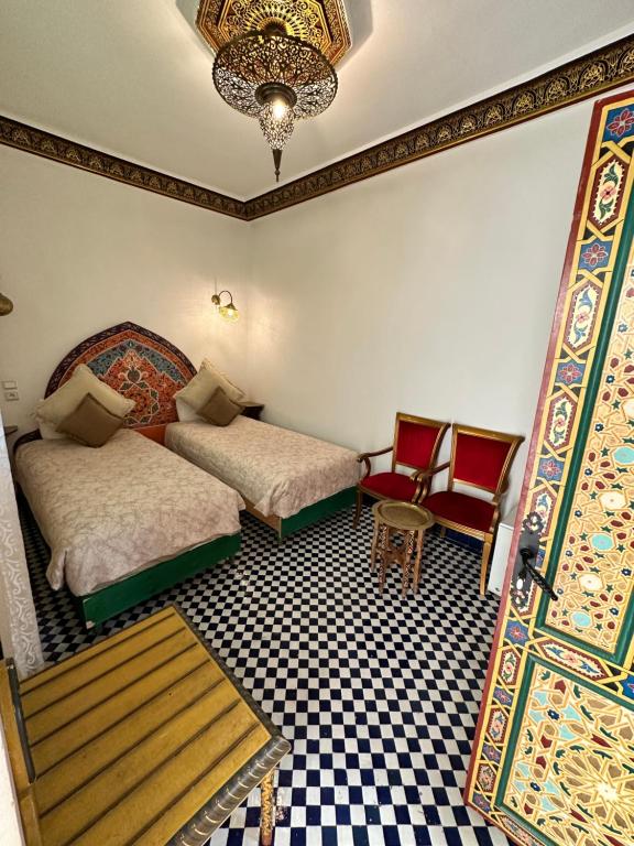 Postel nebo postele na pokoji v ubytování Riad Shama Fes