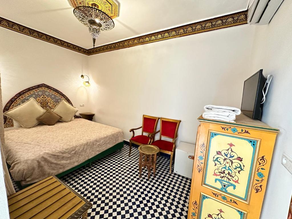 Postel nebo postele na pokoji v ubytování Riad Shama Fes