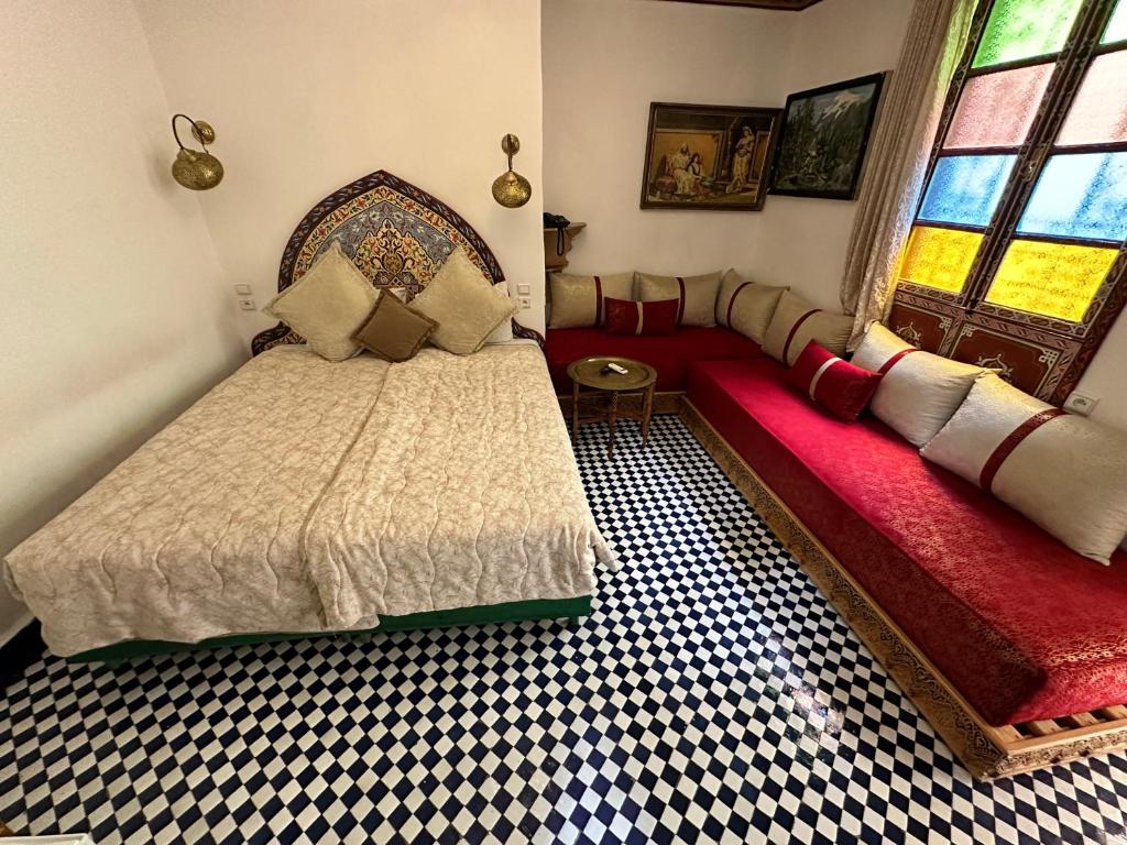 Postel nebo postele na pokoji v ubytování Riad Shama Fes