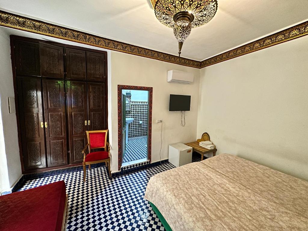 Postel nebo postele na pokoji v ubytování Riad Shama Fes