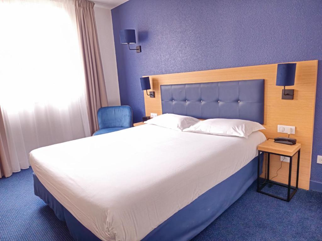 Postel nebo postele na pokoji v ubytování Best Western Hôtel Le Sud