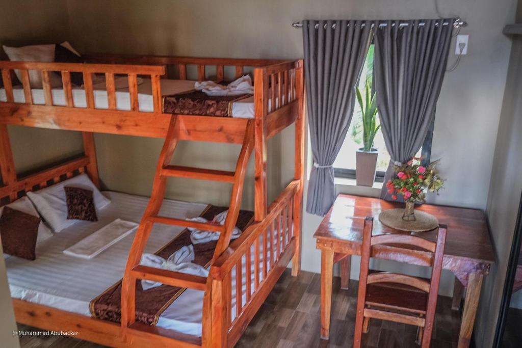 Postel nebo postele na pokoji v ubytování Camaya-an Paradise Beach Resort