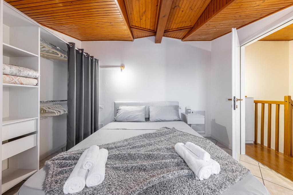 Postel nebo postele na pokoji v ubytování Gallarate Central Suite