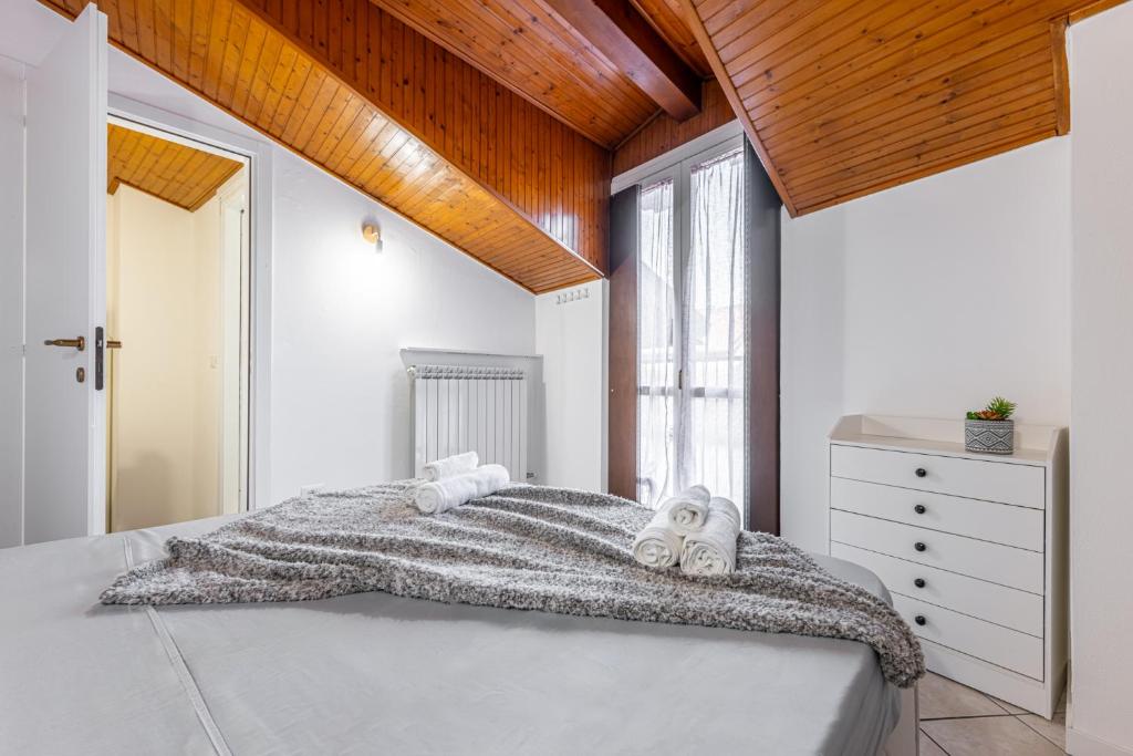 Postel nebo postele na pokoji v ubytování Gallarate Central Suite